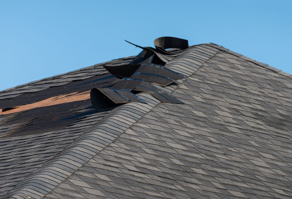 Wind Damage Repairs by Performance Roofing and Impact Windows LLC